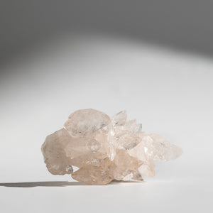 stellar beam calcite on a light gray background