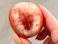 
                
                    Load and play video in Gallery viewer, Carnelian Freeform Palmstone - 03
                
            
